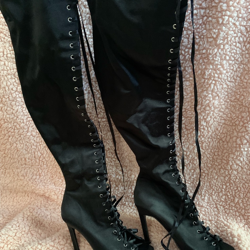Over the knee lace up heel boots